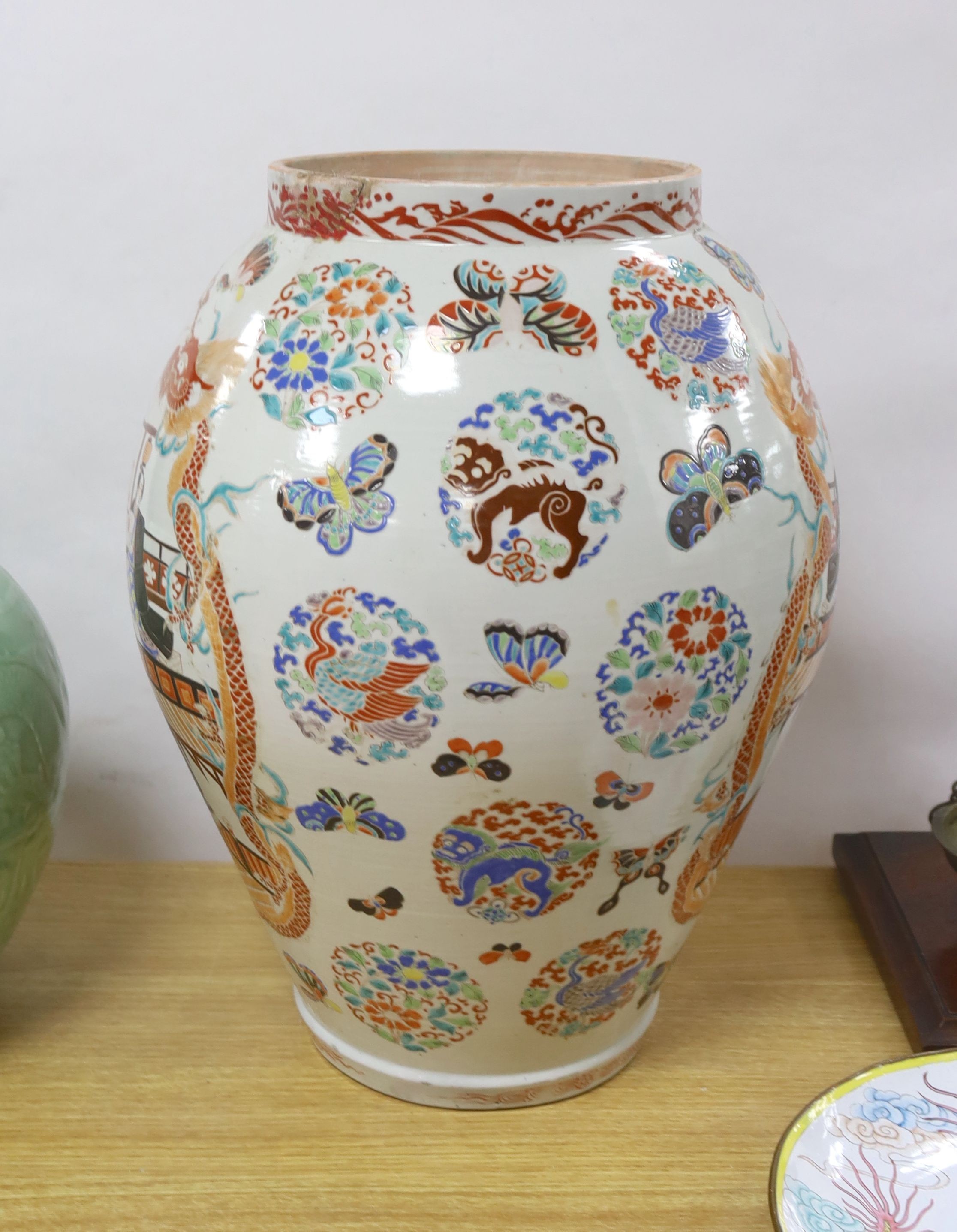 A large Japanese kutani enamelled ovoid vase, lacking cover, 52cm